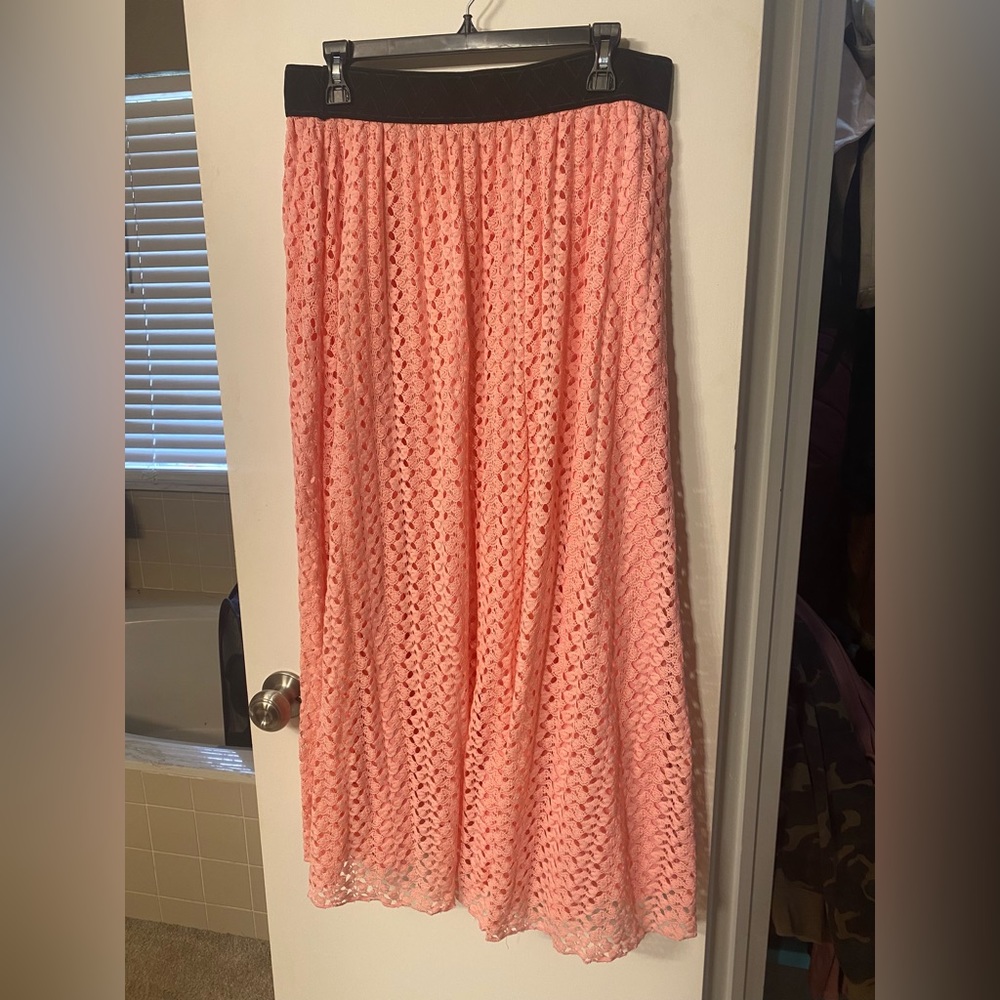 Cute coral/pink and black maxi skirt. Never worn.